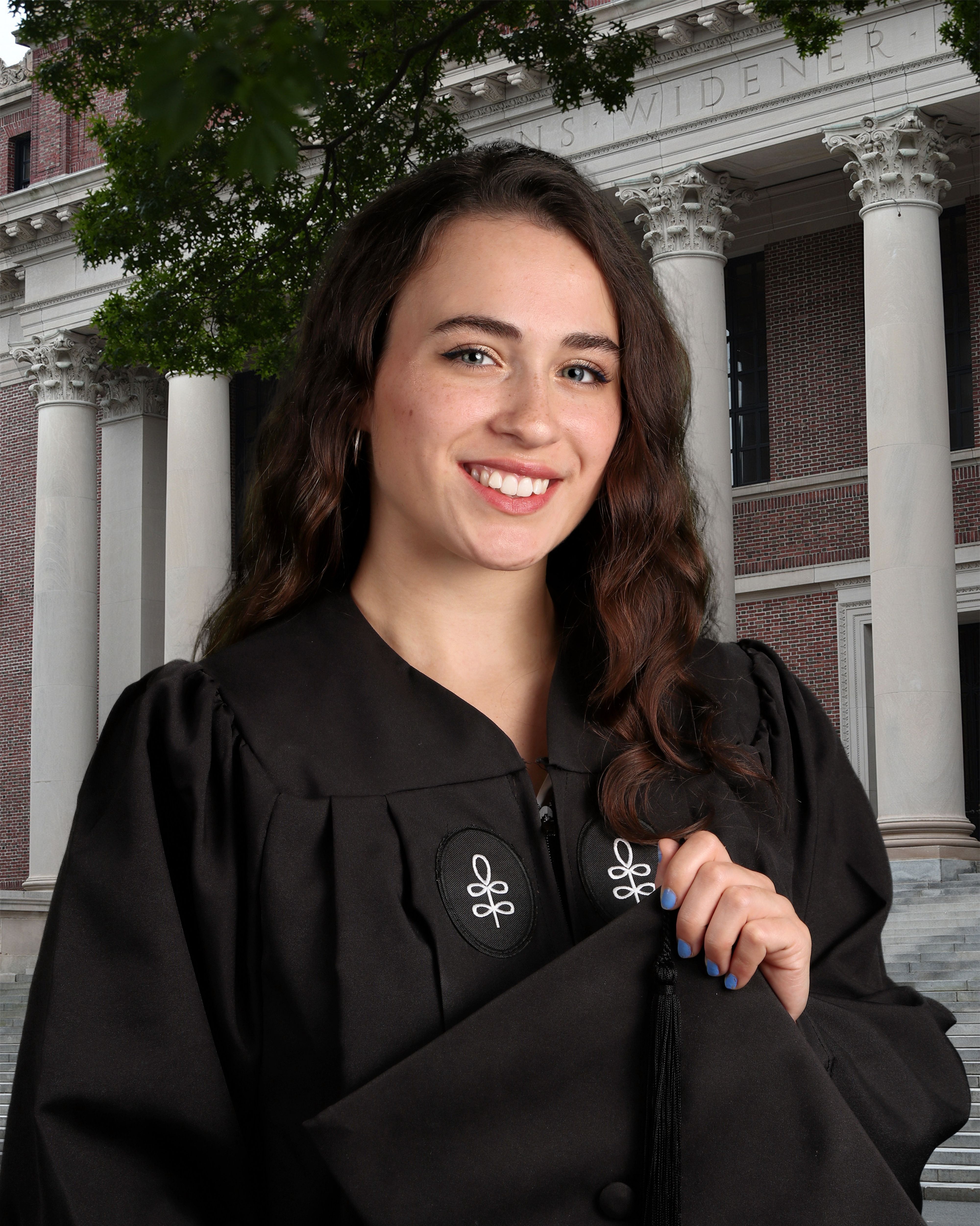 Athena holding a cap